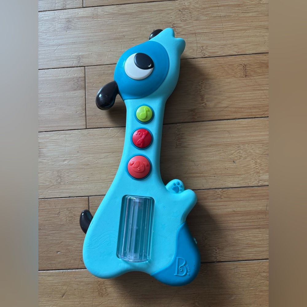 B toys dog guitar. Wicked fast shipping.